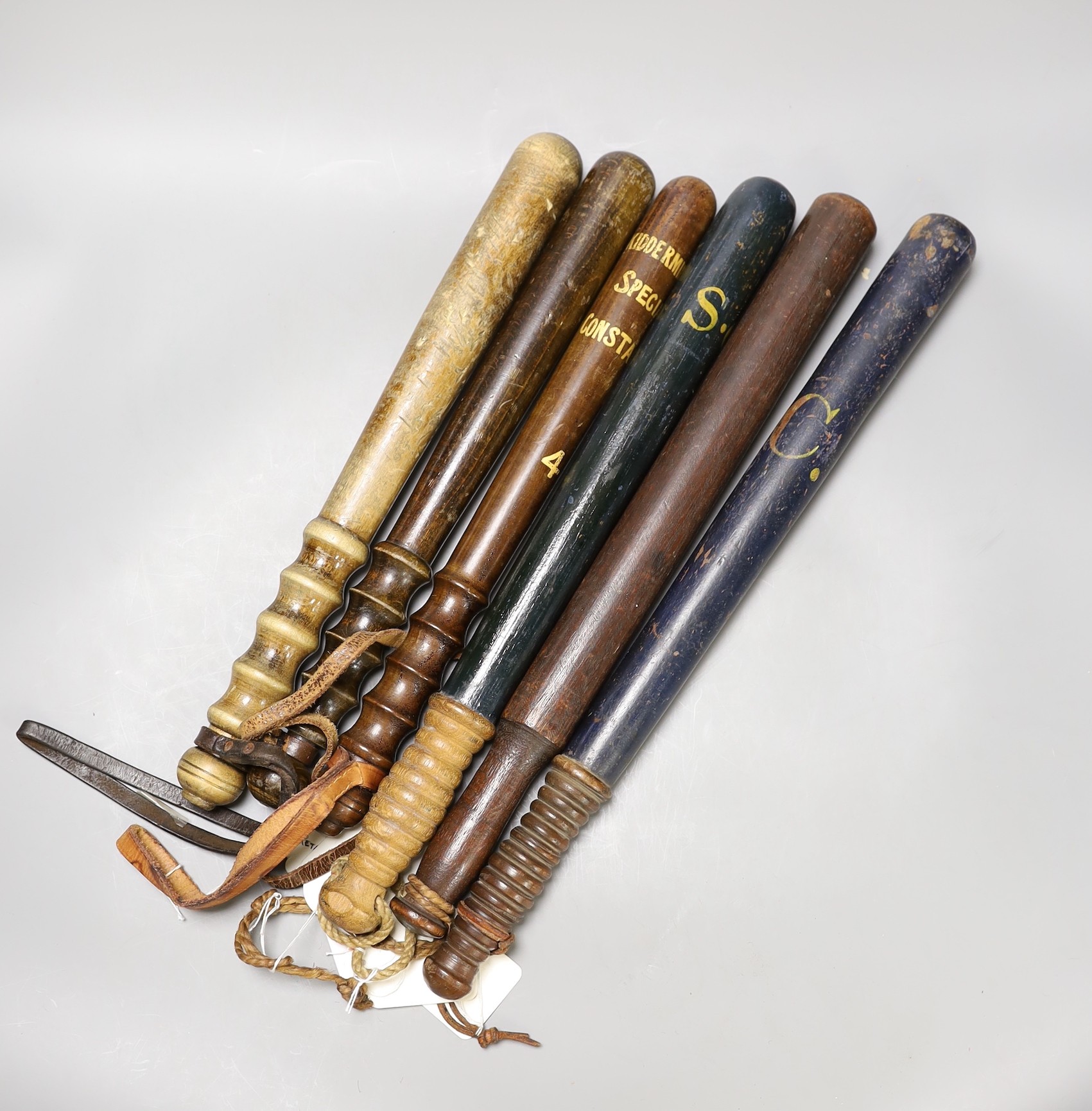 Six early 19th century and later truncheons, three painted.